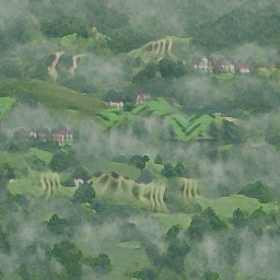 Mist over green hills